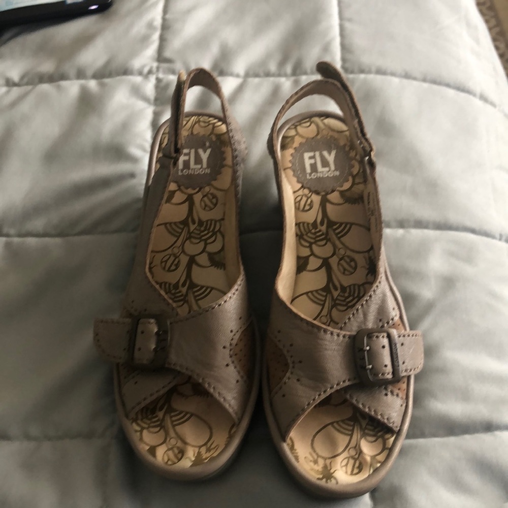 Slightly used Fly London slip on sandal